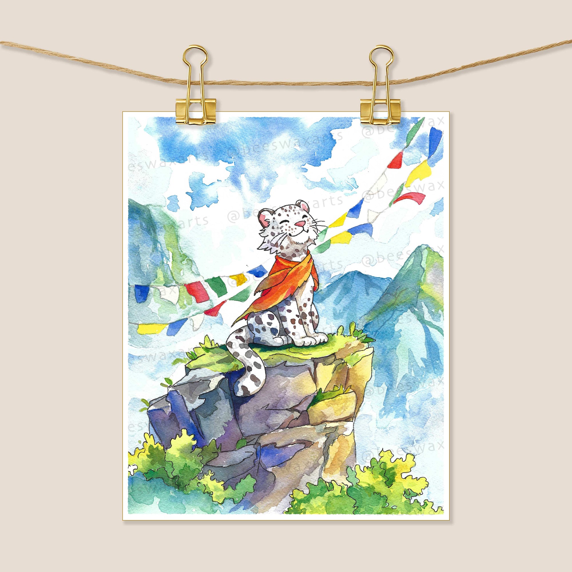Snow Leopard Enlightenment by Beeswax Arts Watercolors features a snow leopard in an orange scarf on a rocky ledge with prayer flags and mountains. Available as an 8x10 archival paper art print.
